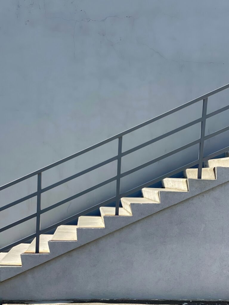 Staircase with metal railing